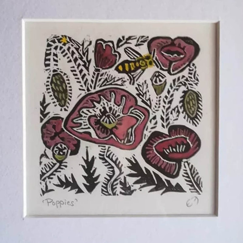 Linocut print of 5 red poppies of various sizes and  a yellow bee all surrounded by decorative foliage