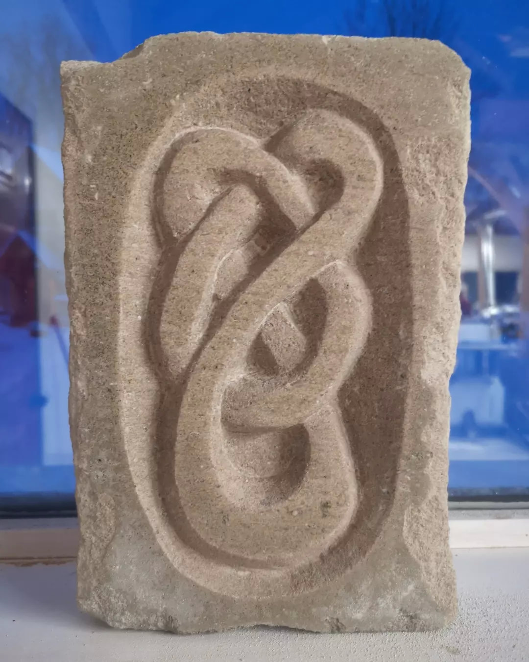 Carved Celtic design in stone slab